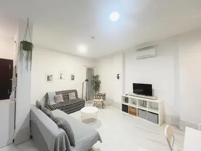 Una televisión o centro de entretenimiento en Center Verónica Confort
