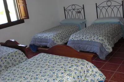Cama o camas de una habitación en Casa Rural El Puerto
