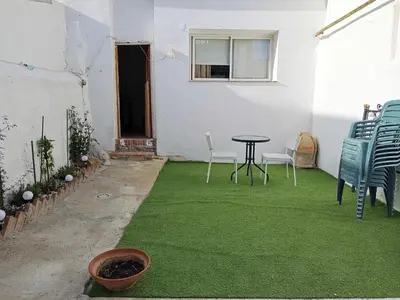 Un patio o zona al aire libre en Habitación Hibisco en La Casa del Patio