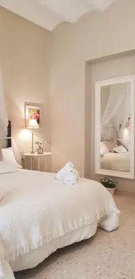 Cama o camas de una habitación en Alameda Center