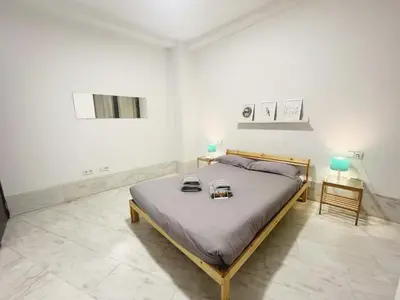 Cama o camas de una habitación en Center Sevilla Confort 5