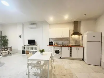 Una cocina o zona de cocina en Center Sevilla Confort 5