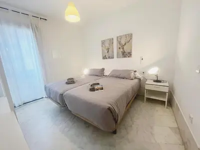 Cama o camas de una habitación en Center Sevilla Confort 6