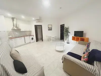 Una televisión o centro de entretenimiento en Center Sevilla Confort 6