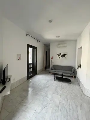 Una televisión o centro de entretenimiento en Center Sevilla Confort 7