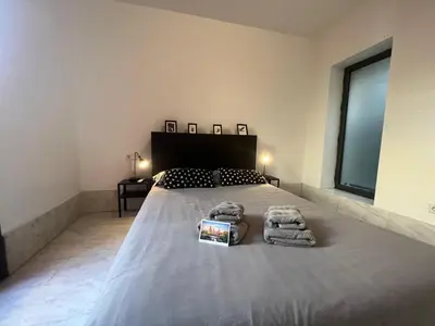 Cama o camas de una habitación en Center Sevilla Confort 8