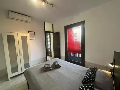 Cama o camas de una habitación en Center Sevilla Confort 8