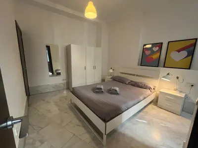 Cama o camas de una habitación en Center Sevilla Confort 9