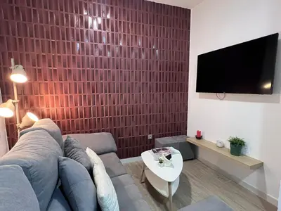 Una televisión o centro de entretenimiento en Casa Mara