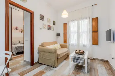 Una televisión o centro de entretenimiento en Moderno y Céntrico Apartamento