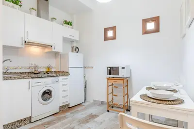 Una cocina o zona de cocina en Moderno y Céntrico Apartamento