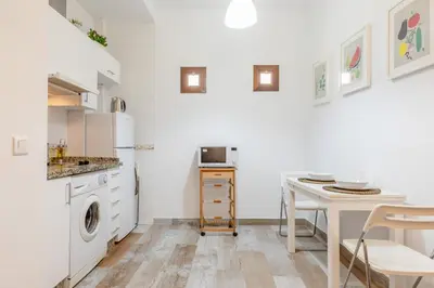 Una cocina o zona de cocina en Moderno y Céntrico Apartamento