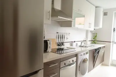 Una cocina o zona de cocina en Confort a un paso del Casco Histórico, parking gratis en el mismo edificio