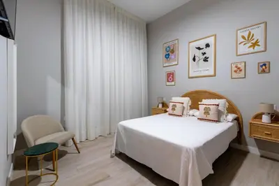 Cama o camas de una habitación en RentalSevilla Plaza de San Quintín