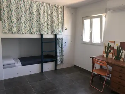 Cama o camas de una habitación en Hostel La Fanega
