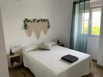 Cama o camas de una habitación en El Rincon de los Girasoles