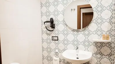 Un baño de Hostal Central Marmolejo