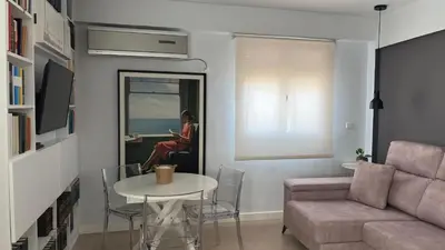Zona de estar de Apartamento San Basilio Bookish Place