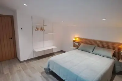 Cama o camas de una habitación en Villa rural el Valle de Aron