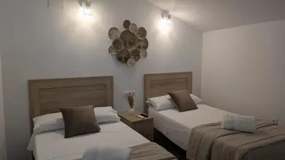 Cama o camas de una habitación en Casa Rural el Olivar Chumi