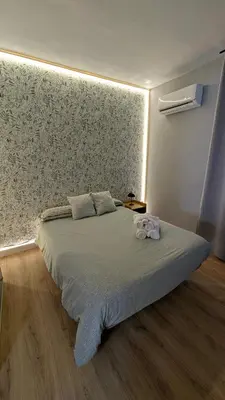 Cama o camas de una habitación en Habitaciones El Lagarto a gusto