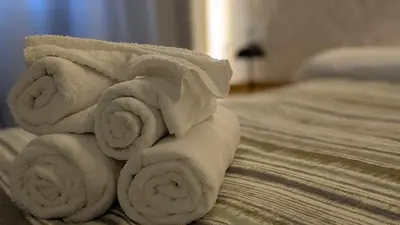 Cama o camas de una habitación en Habitaciones El Lagarto a gusto