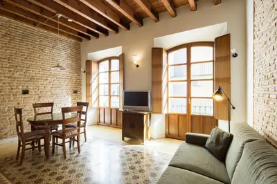 Una televisión o centro de entretenimiento en Veoapartment Casa Relator