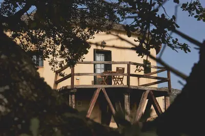 Un balcón o terraza de ALOJAMIENTO TURISTICO- AGROTURISMO Dehesa La Pared