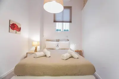 Cama o camas de una habitación en Amplio apartamento de diseño precioso con parking incluido en pleno centro