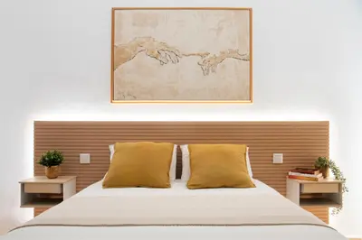 Cama o camas de una habitación en Confort en el Casco Antiguo de Sevilla