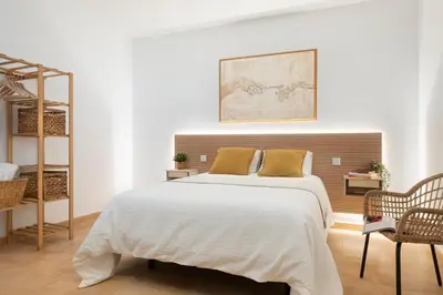 Cama o camas de una habitación en Confort en el Casco Antiguo de Sevilla