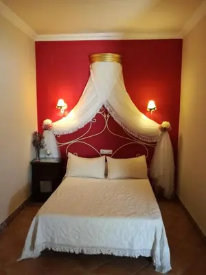 Cama o camas de una habitación en Hotel Rural Andalucia