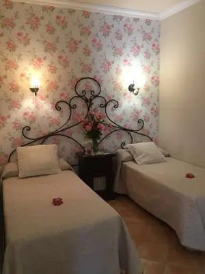 Cama o camas de una habitación en Hotel Rural Andalucia