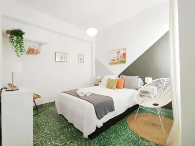 Cama o camas de una habitación en SEVILLA CENTRO GIRALDA 3 dormitorios