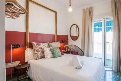 Cama o camas de una habitación en SEVILLA CENTRO GIRALDA 3 dormitorios