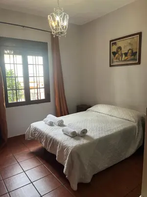 Cama o camas de una habitación en Casa Puente ROMANO cerca de Sevilla