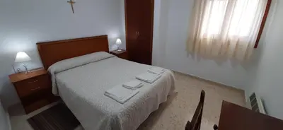 Cama o camas de una habitación en Convento Madre de Dios de Carmona