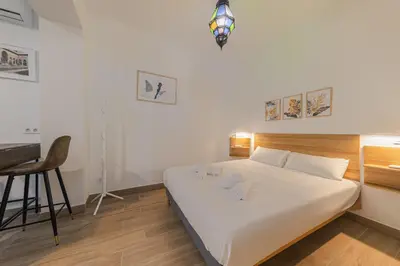 Cama o camas de una habitación en Feria Corner