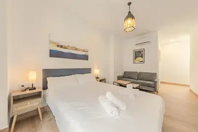 Cama o camas de una habitación en Feria Corner