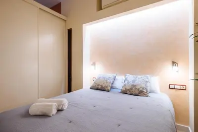 Cama o camas de una habitación en Novalia Home Peñuelas
