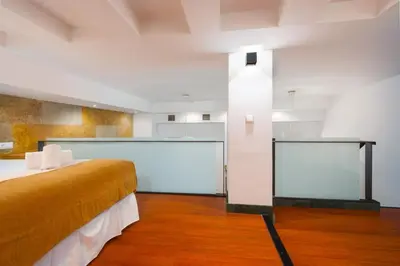 Cama o camas de una habitación en Modern Duplex - Loft Style - Historic Centre