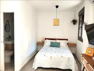 Cama o camas de una habitación en Estudio Alamillo 1