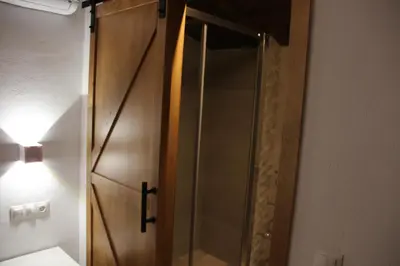 Un baño de Ático de la Miel