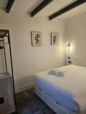 Cama o camas de una habitación en Suite Pepe