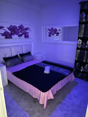 Cama o camas de una habitación en Apartament Luxor