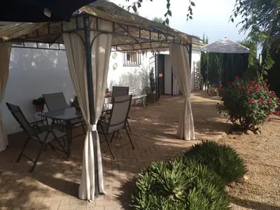 Jardín al aire libre en La Casa del Abuelo Jose