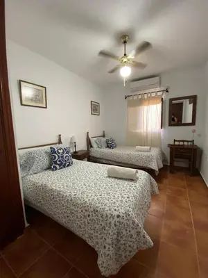 Cama o camas de una habitación en La Casa del Abuelo Jose