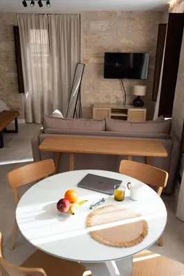 Una televisión o centro de entretenimiento en Mirador del Pósito - Apartamento luminoso en el centro de Jaén