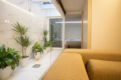 Zona de estar de WISH SUITE Puerta Osario