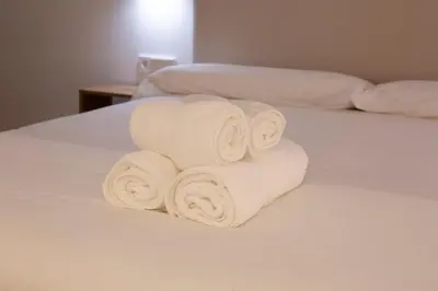 Cama o camas de una habitación en WISH SUITE Puerta Osario